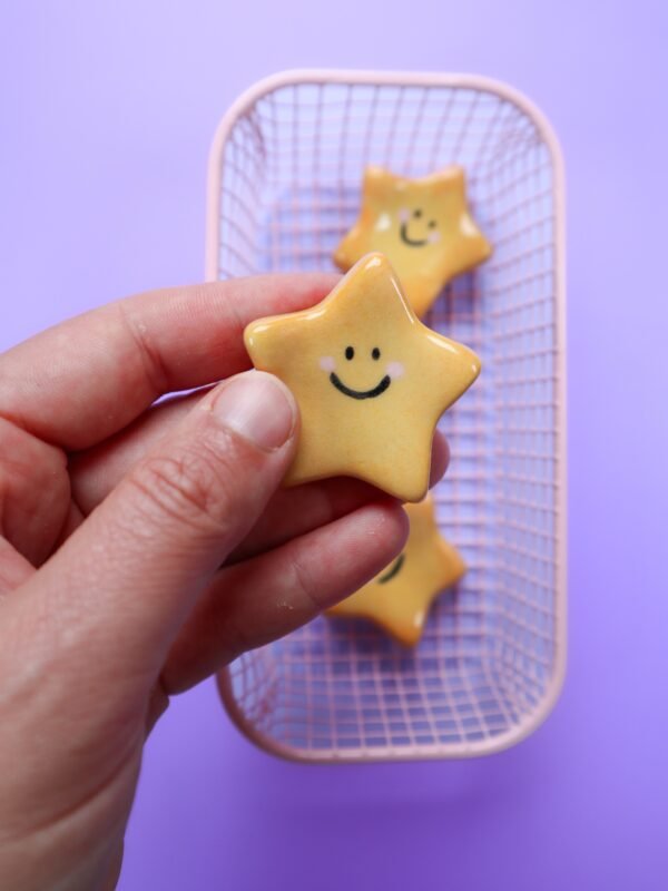 Doudou Étoile souriante